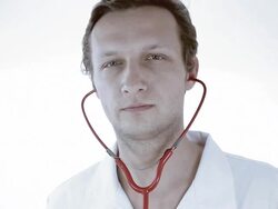 Doctor examines Stock Footage