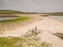 T/L tide coming in gradually over sand bar, Scilly Isles, Cornwall, United Kingdom Stock Footage