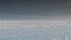 The sun sets over the vast, desolate Alaskan tundra. Stock Footage