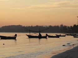 Fishing boat floating on the sea at sunset. Stock Footage