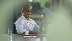 MS Businessman Having Conversation Over A Mobile Phone Stock Footage