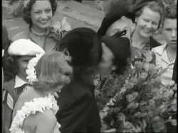 Florence Chadwick finishes her historic swim across the English Channel and participates in a parade and celebration. News Clip