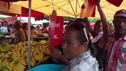 CLEAN : French centrist candidate Macron visits Reunion market News Clip