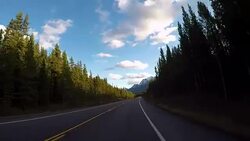 POV from car as it dives along mountain road Stock Footage