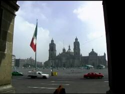 Mexico City Zocolo church and plaza with Mexican Flag Stock Footage