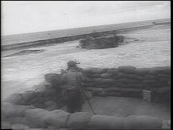 B/W 1962 PAN soldiers adjusting guns in emplacements on coast / Havana / Cuban Missile Crisis Stock Footage