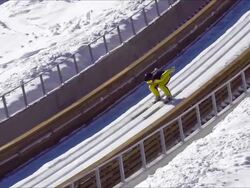 HD Super Slow-Mo: Young Man Performing Ski Jump Stock Footage