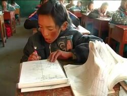 Group of Tibetan schoolchildren in classroom, Duiling Village, Tibet Stock Footage