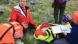 Langdale/Ambleside Mountain Rescue Team members doing first aid training using members of the casualties union, Ambleside, Lake District, UK. Stock Footage