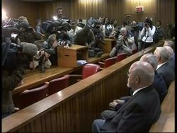 Trial of apartheid-era security minister, protest, comments News Clip