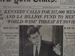 July 26, 1961 close up zoom in New York Times headline about Soviet threat over photo of JFK Stock Footage