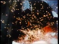 1970s slow motion low angle close up space shuttle rockets firing up + sparks flying around / educational Stock Footage