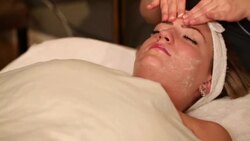 Facial Treatment Rub Cream on Face Stock Footage