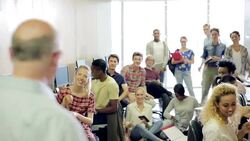 Smiling students clapping and leaving computer class Stock Footage