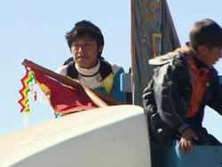 Rural children with traditional banners at spring festival, Cala Cala, Bolivia Stock Footage