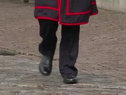 CU PAN TU TS Beefeater walking / London, UK Stock Footage