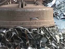 MS POV Magnet lifting steel scrap at scrapyard / Bous, Saarland, Germany Stock Footage