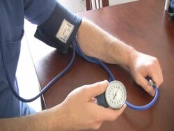 man checking his blood pressure sphygmomanometer  pal Stock Footage