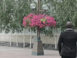 MS Young man in black suit dancing and walking on street / Minneapolis, Minnesota, United States Stock Footage