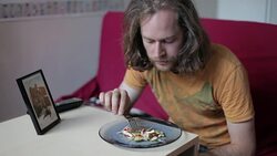 Man eating salad Stock Footage