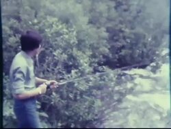 1970s Teenager Fishing (from 8mm film camera) Stock Footage