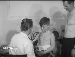1953: REFUGEES: BERLIN, GERMANY: VS Various male refugees, children & men, lining up for physical check up, examination, (checking for tuberculosis), doctor using stethoscope on young boy. Berlin Wall, occupied city Instructional Video