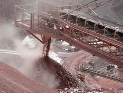 MS Stone releasing from machine at quarry / Taben-Rodt, Hesse, Germany  Stock Footage