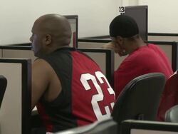2009 MS Two men using computers in job center computer lab/ Antioch, California, USA/ AUDIO Stock Footage