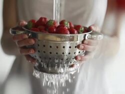 Washing strawberries SloMo Stock Footage