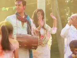 Indian joint family playing holi and dancing, Delhi, India Stock Footage