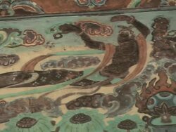 CU PAN ZI Shot of Buddhism mural of flying asparas in Mogao Grottoes / Dunhuang, Gansu Province, China Stock Footage