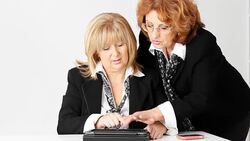 Two mature women in business Stock Footage