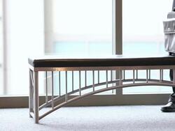  MS Businessman straddling bench and working on laptop computer / Seattle, Washington, United States Stock Footage