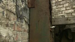 Crumbling brick and old fixtures characterize an abandoned factory. Stock Footage