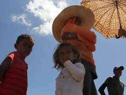 MS LA Shot of Family collecting water from shafts / Pilao Arcado, Bahia, Brazil Stock Footage