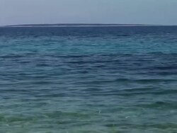 HD: Reading On The Beach Stock Footage