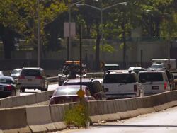 Shot of cars moving along a section of the FDR drive in New York City Stock Footage