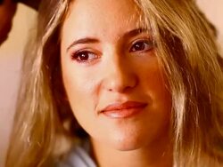 Curling hair for a beautiful young woman Stock Footage