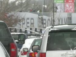 MS Shot of cars, Super Bowl XLV in snow storm with Cowboys Stadium / Arlington, Texas, United States Stock Footage