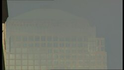 Police and damaged building near WTC site News Clip