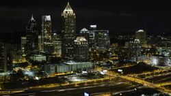 Elevated view over Interstate 85 passing the Midtown Atlanta skyline, Georgia, United States of America Stock Footage