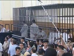 Protest outside trial of 2 Egyptian policemen charged with brutality News Clip