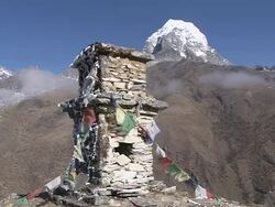 MS ZO View of Taboche Peak with Chorten and prayer flag / Pangboche Khumbu Region Nepal Stock Footage