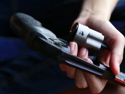 Female Hand Reloading Ammunition, Revolvers Stock Footage