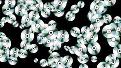 Shiny compact discs appear on a black background. Stock Footage