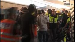 Argentina - Packed train slams into station killing 49 News Clip