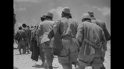 Italian soldiers captured by advancing British troops in Western Desert in North Africa during World War II News Clip