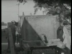 Horse and cart taking water container, UK  1939 Stock Footage