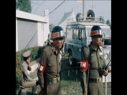 SYND 24 1 78 18 STUDENTS ARE ON TRIAL IN BANGKOK, CHARGED WITH COMMUNISM, TREASON AND INSULTING THE MONARCHY News Clip