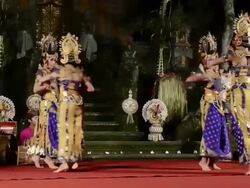 MS T/S Balinese girl dancers performing Nyamar Dance ( Love Story ) in Puri Saraswati temple AUDIO / Ubud, Bali, Indonesia Stock Footage